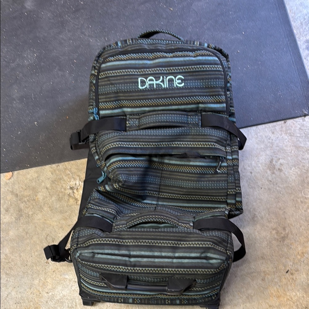 Dakine black and Green split roller luggage with Durable Design